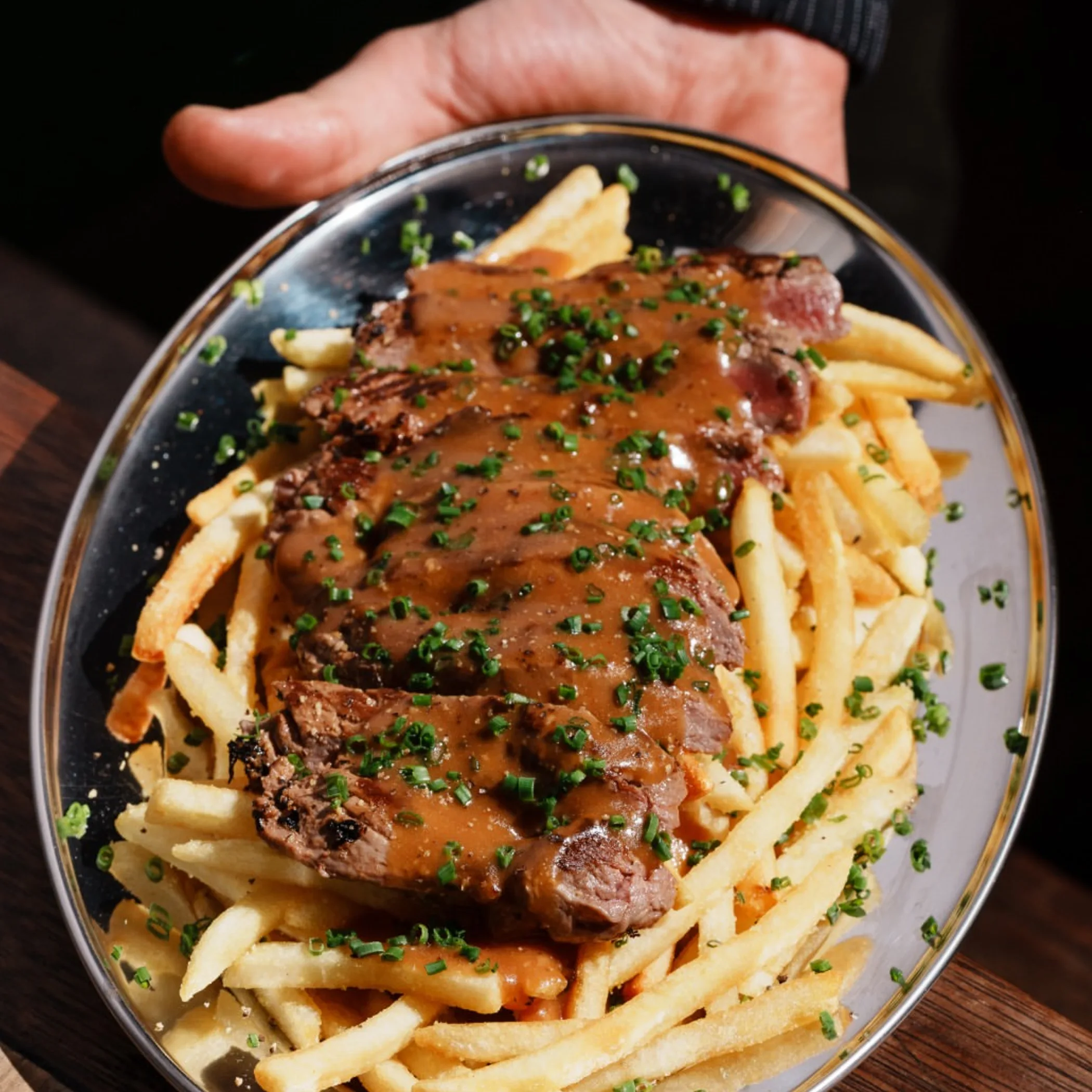 steak with fries on plate
